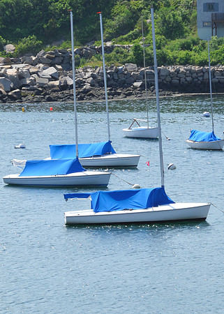 Three blue boats